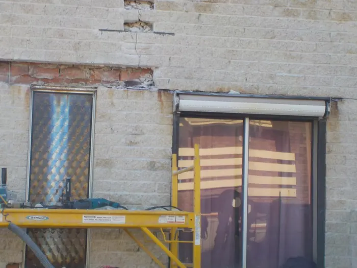Lintel replacement from scaffold on an apartment block