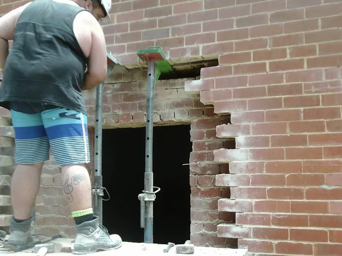 New door opening formed in existing brickwork