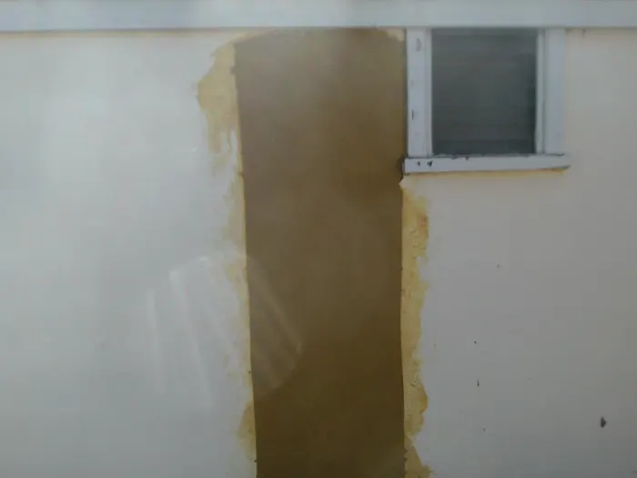 Rendered wall re-rendered after crack stitching